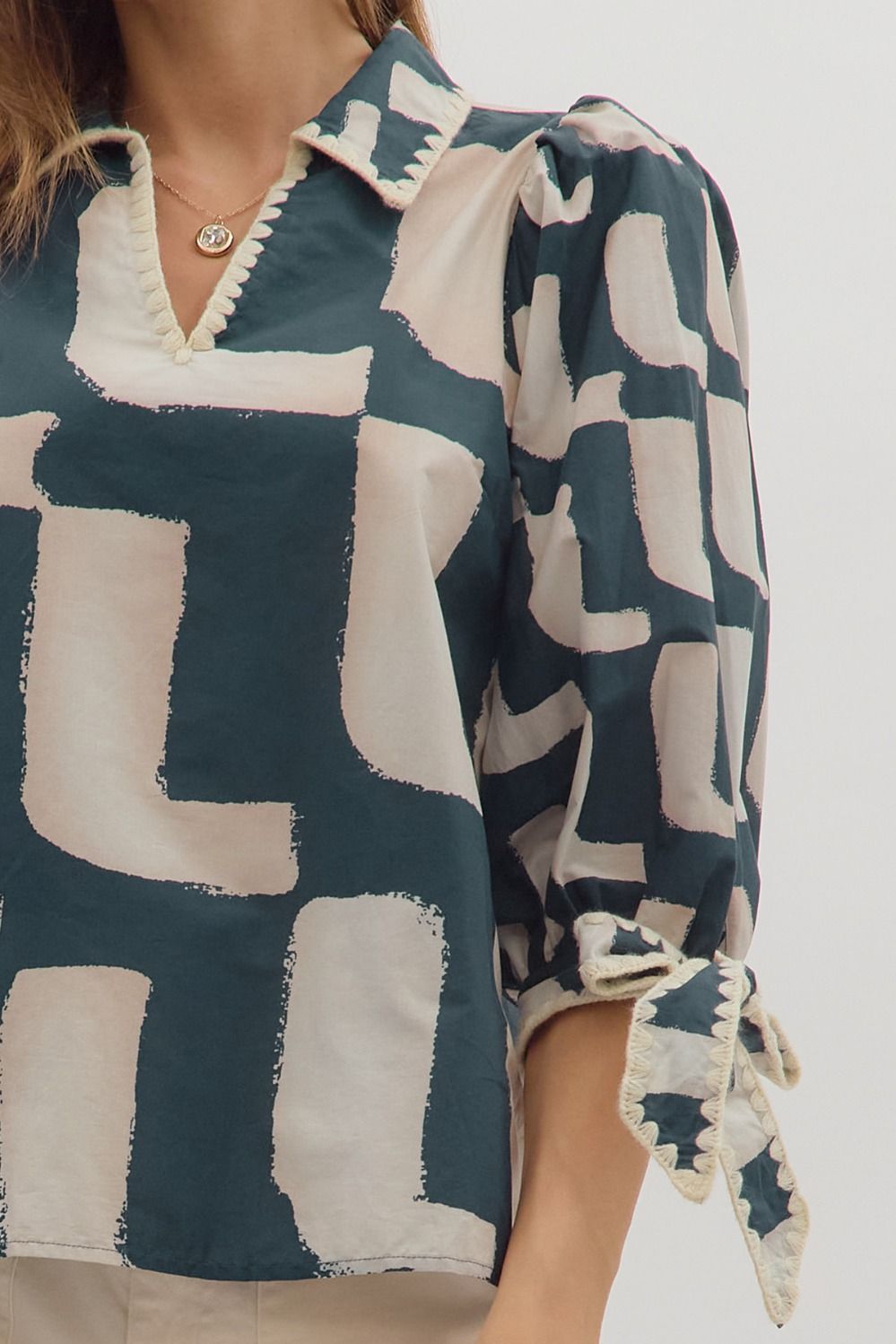 Navy Abstract Top with Bow Sleeve
