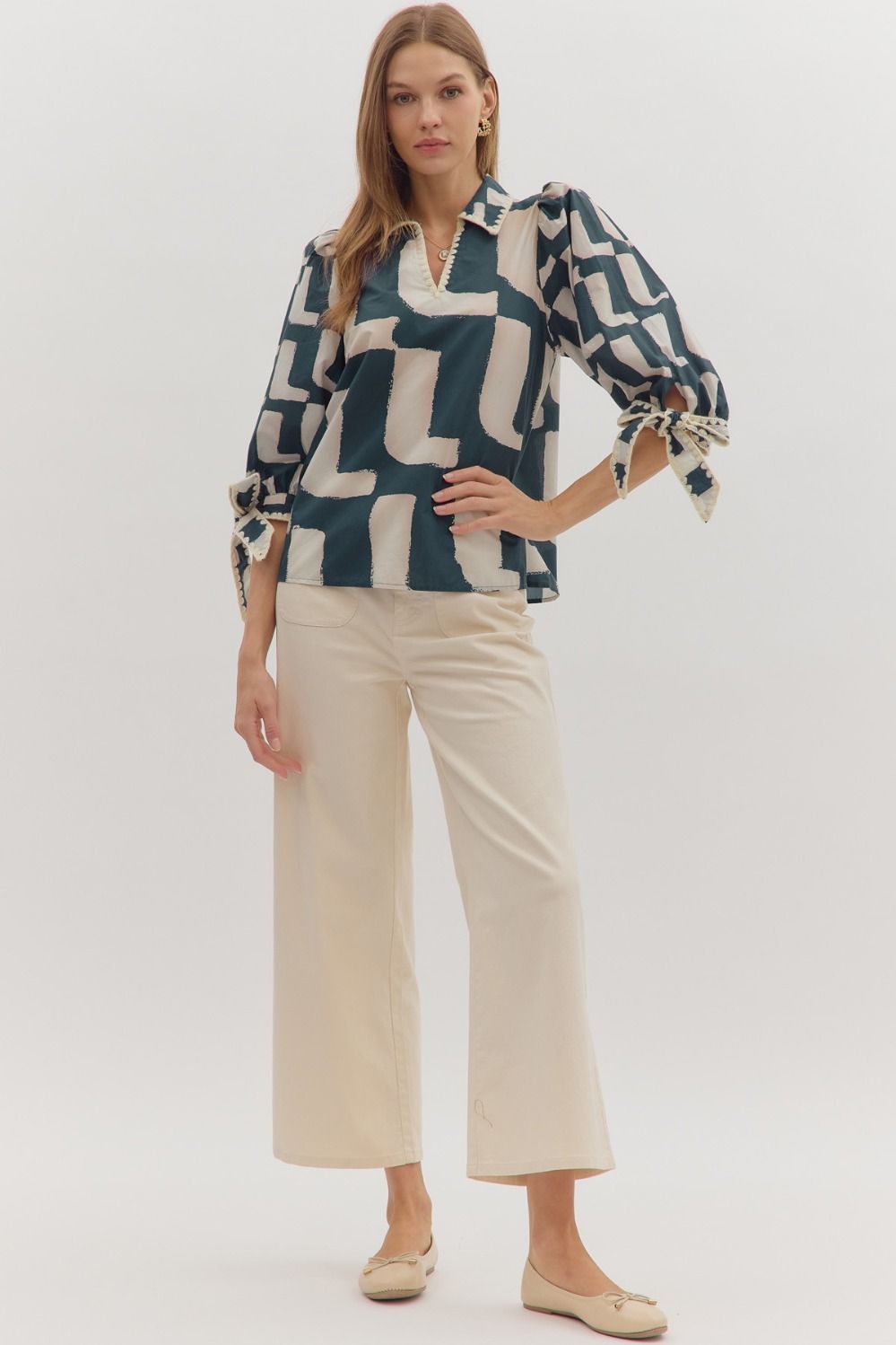Navy Abstract Top with Bow Sleeve